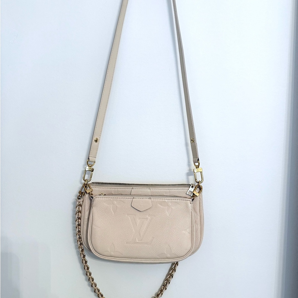 Empreinte Monogram Giant Pocette Louis Vuitton Cream Crossbody Bag